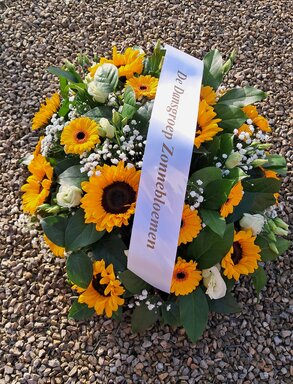 grafstukmetzonnebloemen.jpg